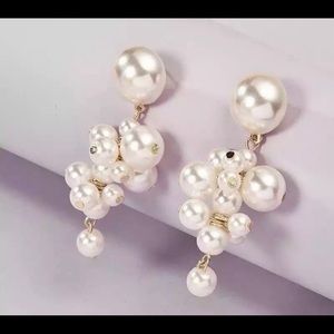 Dangling pearl cluster earrings